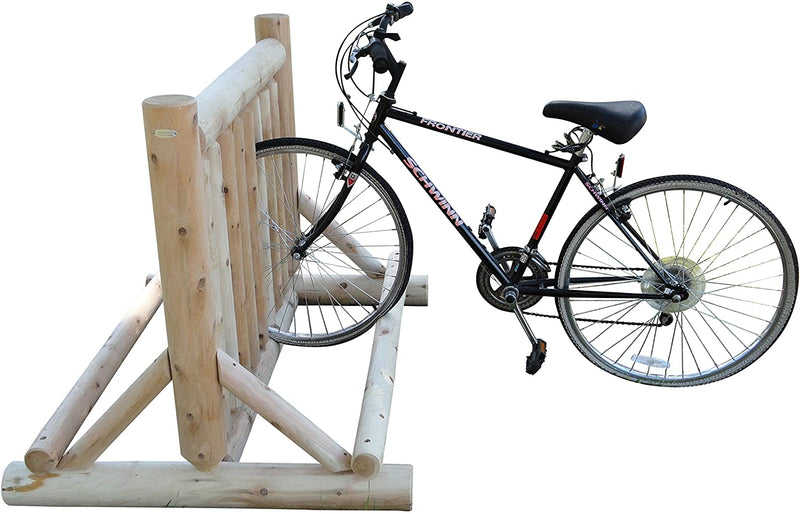 Log freestanding bike rack shown holding a schwinn frontier road bike. image is over a white background. 