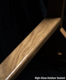 High-Gloss Outdoor Sealant shown on the middle of the freestanding surfboard rack. The wood has a beautiful grain showing.