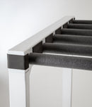 Close up image of the Marshmellow white surfboard rack, on a white background. The rack has foam dowels that come out perpendicular to the rack, and has black foam padding in between each dowel.