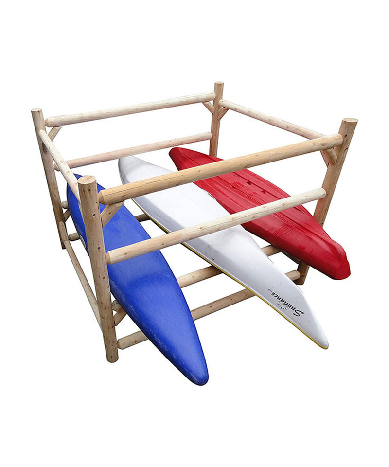 A free standing rectangular shaped log kayak rack with 4 vertical posts that are connected with 4 rows of horizontal log beams that allow for a total of 12 watercraft to be stored.