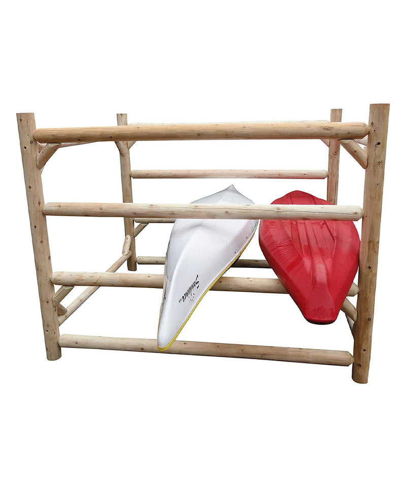 An all white background, with the primary focus of the photo being a white cedar log square shaped, 72” tall assembled kayak rack that has 4 horizontal rows that allow for storage.  Showing 2 kayaks being stored in the rack one white and one red