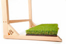 Grassy Surf Rack plush green protective grass base detail shot on white background.