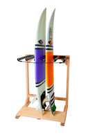 Woody Surf Rack shown on a white background. The rack is holding two high performance surfboards in the middle of the rack. This is a vertical freestanding surfboard rack hand-made of high quality wood.
