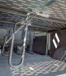 This rack being shown mounted on the underside of a platform within a sprinter / utility van. The rack keeps the board up off the vans floor safely out of harms way. Removing the need for a board bag.