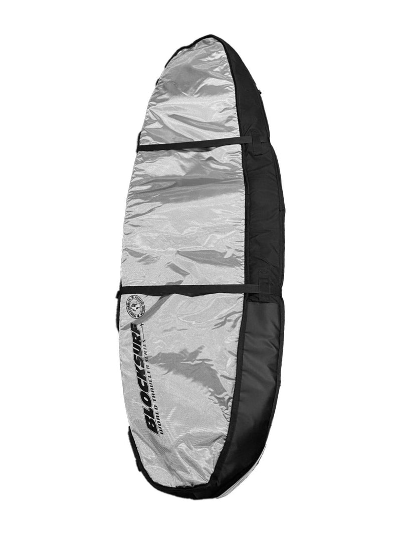 A heavy duty compact surfboard travel bag resting on its side, displaying the UV reflective underside.