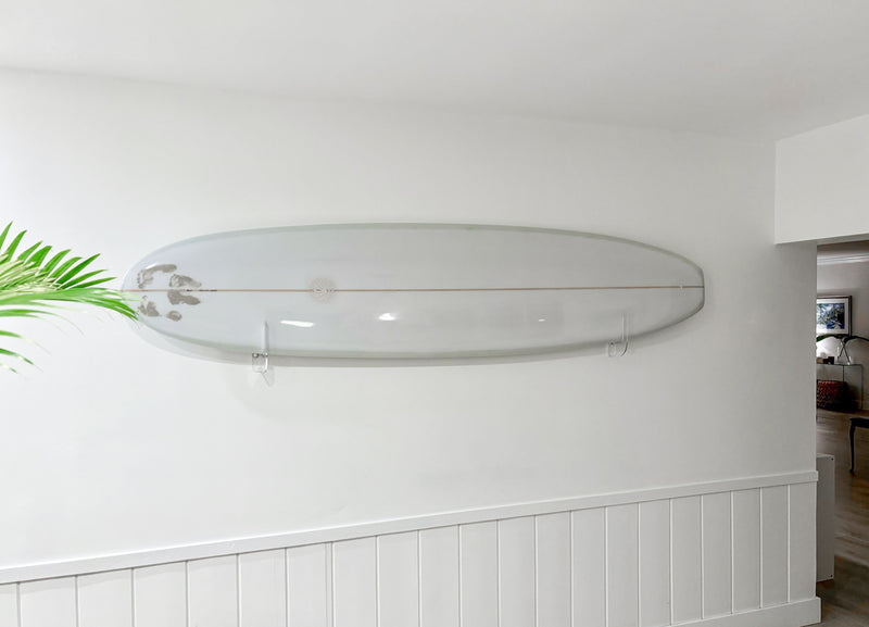 Customer photo showing the flush-mount version of the acrylic surfboard wall mount shown mounted horizontally in a kitchen.