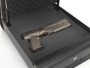 Handgun shown stored in the Boostedsafe elite with the foam cutaway - on a white background
