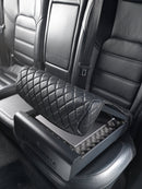 Boostedsafe shown in the open position ready to secure an Apple laptop securely in the back of a vehicle. 