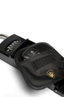 Up close view of the Keysafe deluxe box being used locking an automotive keyfob in the RFID blocking pouch.