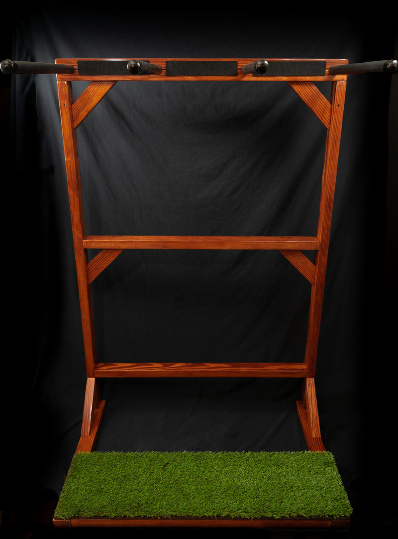 SUP Grassy vertical Stand Up Paddle board rack shown on a black background. The rack has a brown mahogany stain and holds the boards vertically.