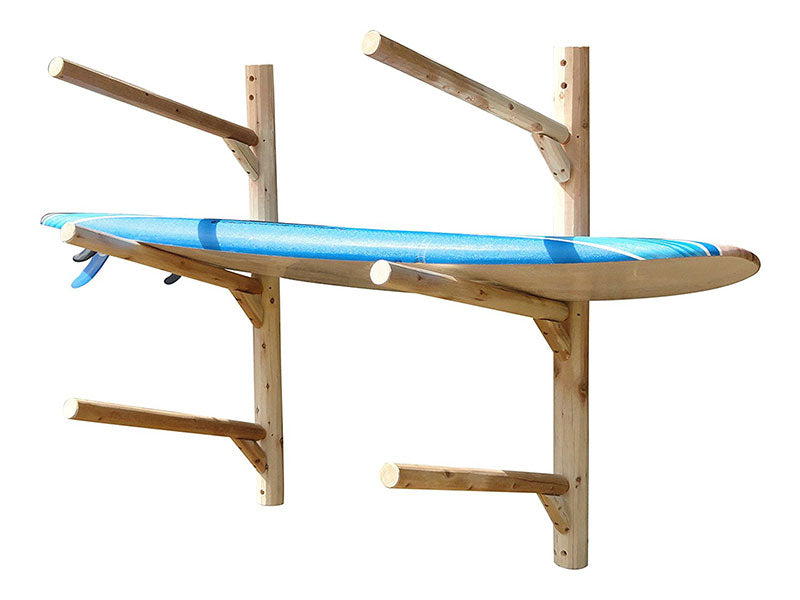 Stand Up Paddle Board, Kayak, or Canoe Wall Rack for 3 boats.  The wooden log rack is shown with 3 levels, and is holding a single stand up paddle board (SUP) on the middle level. 