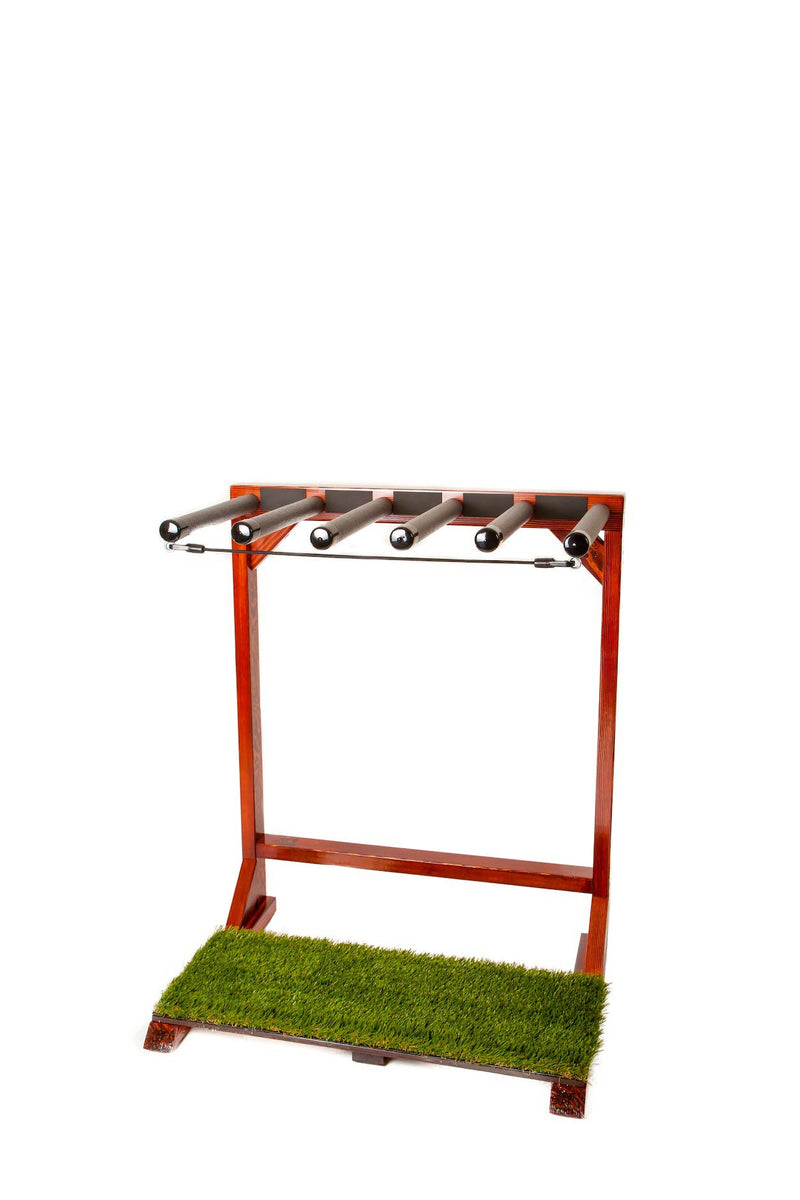 Finished Grassy Surf Rack shown by itself on a white background.  No surfboards are shown in the rack.  The wood is a dark brown color, and has a green grass base. 