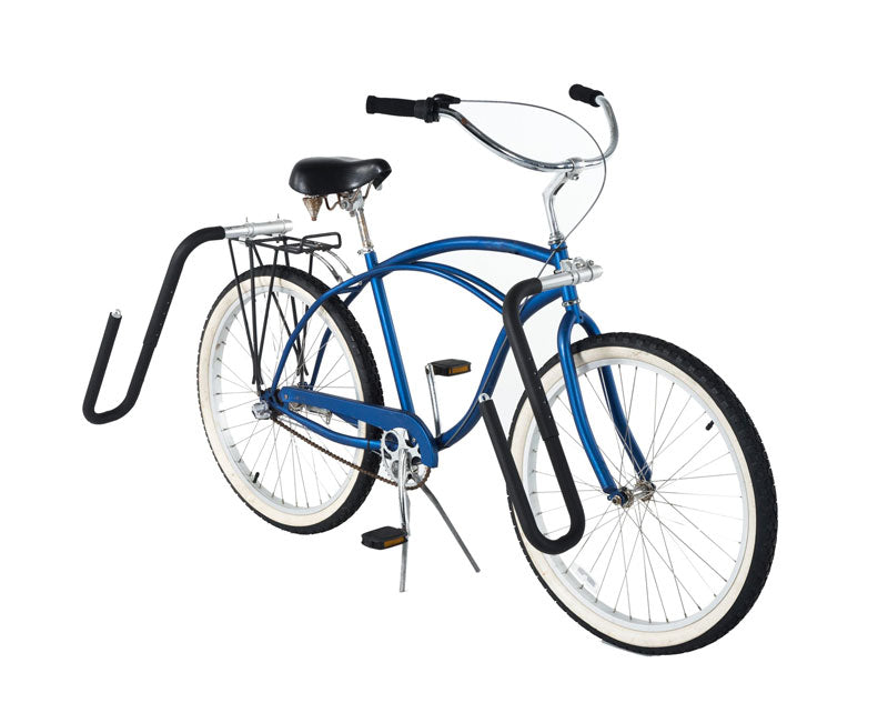 Dual-Mount surfboard rack shown Installed on a rear bicycle luggage rack.  The bicycle is a beach cruiser and is blue in color. 