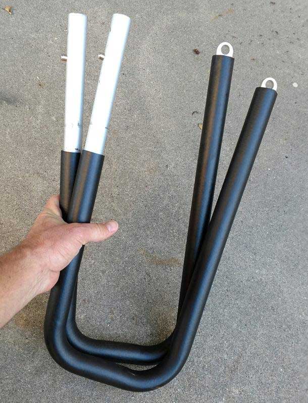 Lower SUP Arms shown with a grey concrete background.  The aluminum pipe is covered in a durable rubber padding to protect the board.
