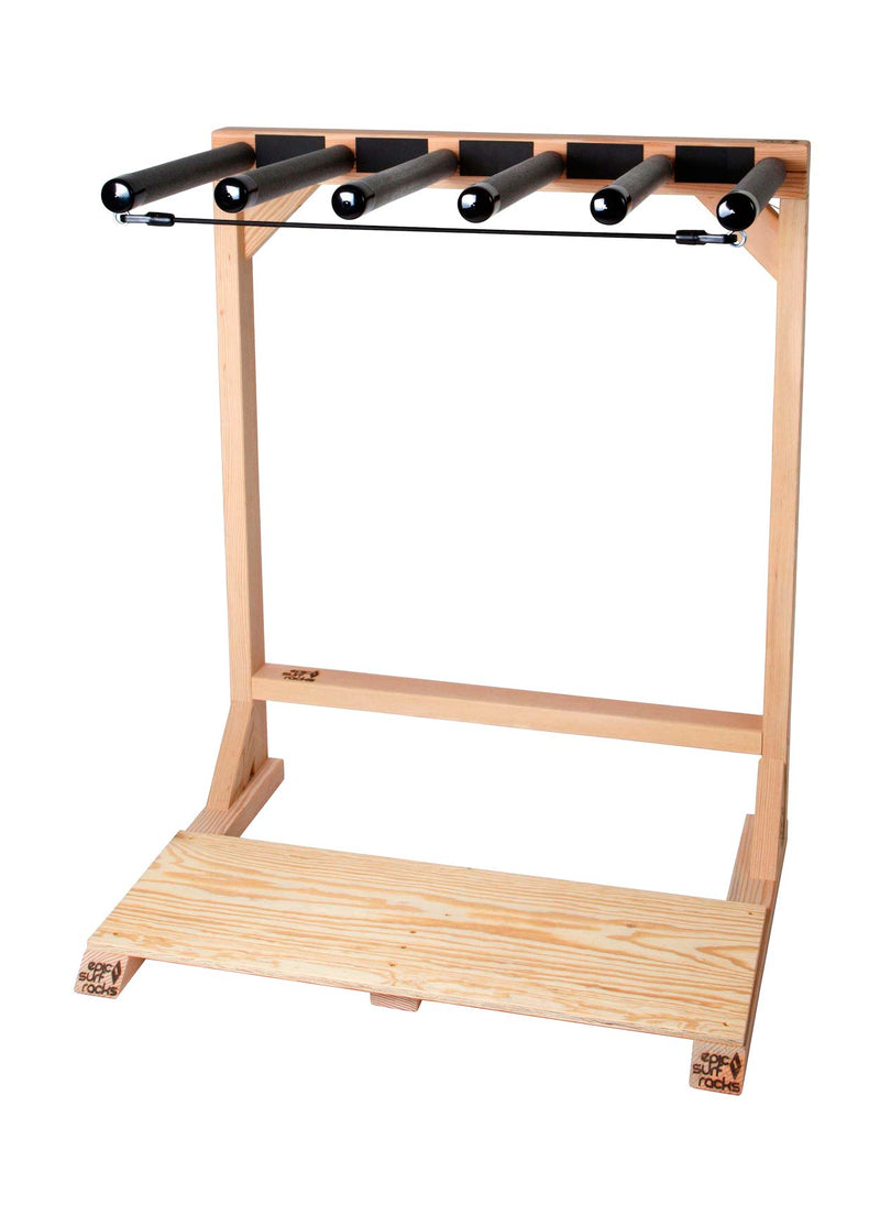 Woody Surf Rack shown in full with no surfboards in the rack.  This shows the locking bungie system.  The rack is sitting on a white floor. 